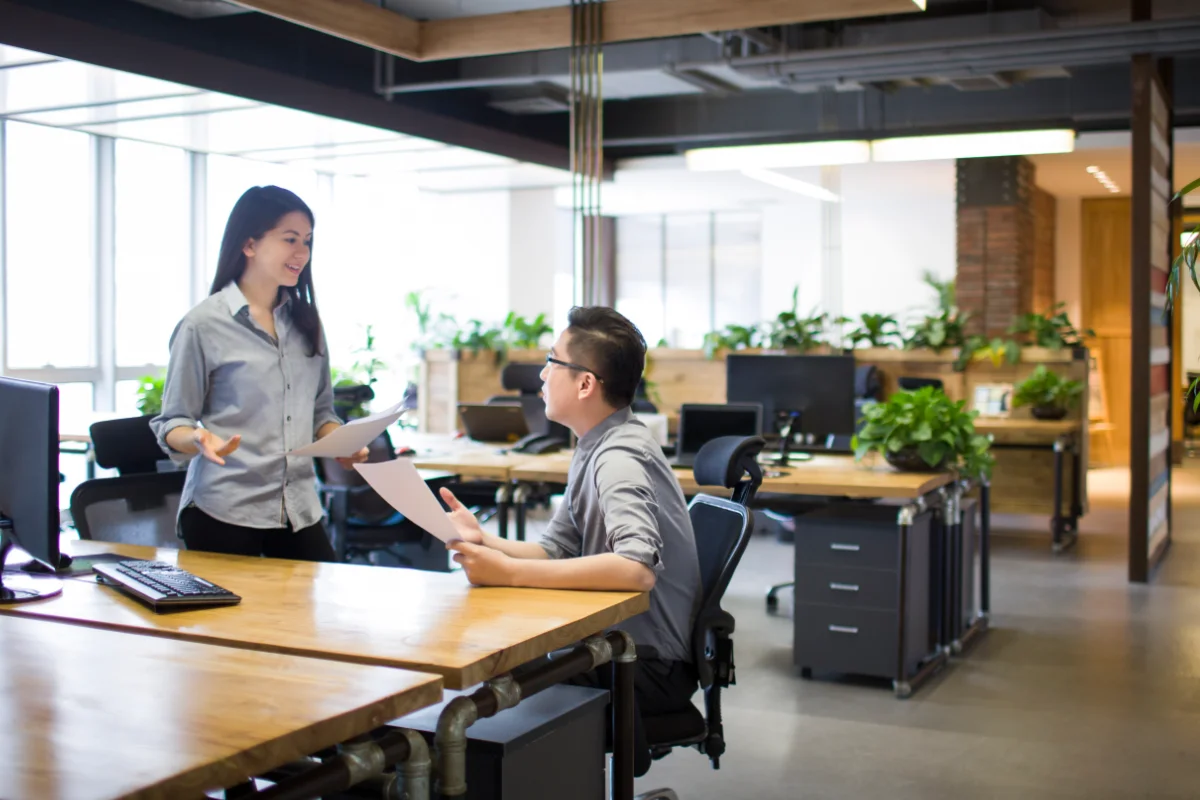 IT workers talking in office